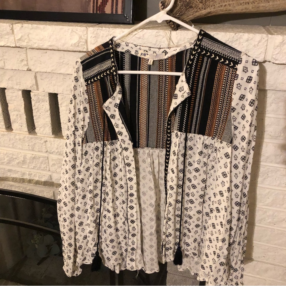 Jolt top from buckle